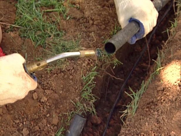 Heating the pipe with a propane torch